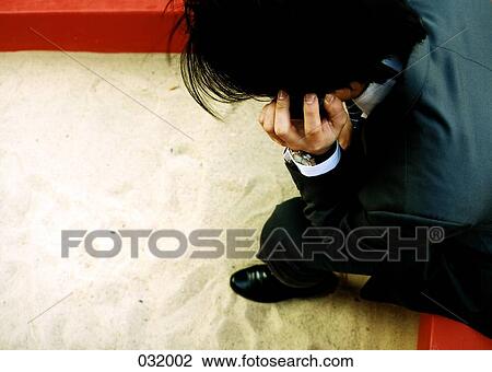 A man talking on a cell phone View Large Photo Image Stock Image - A man talking on a cell phone. Fotosearch