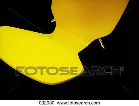 A yellow chair View Large Photo Image Stock Image - A yellow chair. Fotosearch