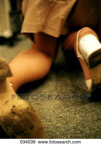 A woman crawling on the floor View Large Photo Image Stock Photo - A woman crawling on the floor. Fotosearch