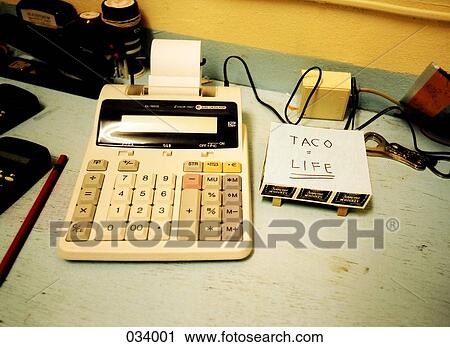 An adding machine on a desk View Large Photo Image Stock Image - An adding machine on a desk. Fotosearch