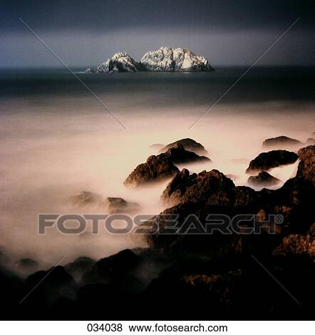 Fog over a mountainous landscape View Large Photo Image Stock Photo - Fog over a mountainous landscape. Fotosearch