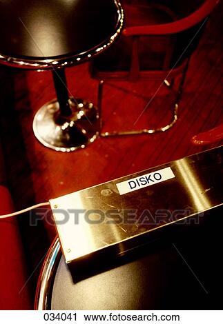 Table and chair in a bar View Large Photo Image Stock Image - Table and chair in a bar. Fotosearch