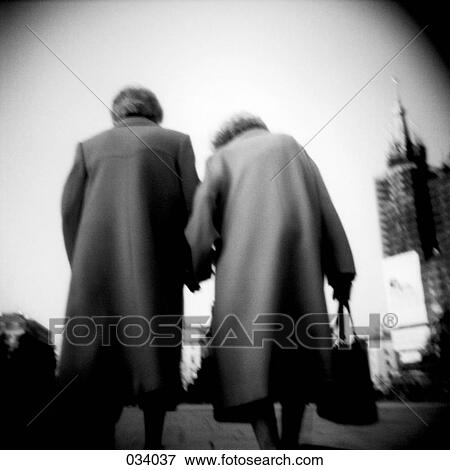 Two elderly women holding hands View Large Photo Image Stock Photo - Two elderly women holding hands . Fotosearch