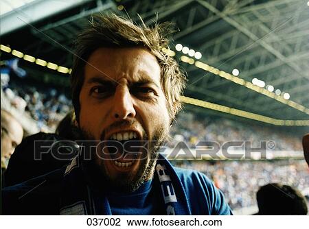 Stock Image - Portrait of a man shouting. Fotosearch