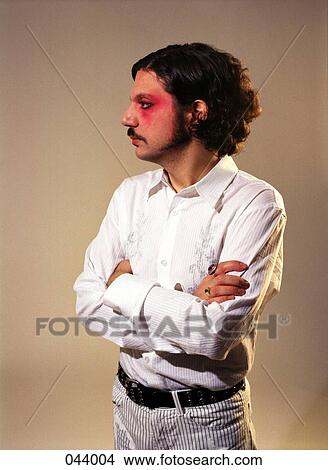 Picture - Portrait of a man with pink around his eye. Fotosearch