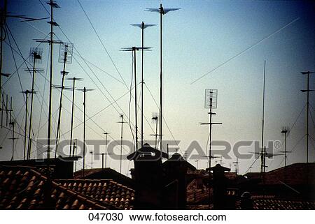 Antennas on rooftops View Large Photo Image Stock Image - Antennas on rooftops. Fotosearch