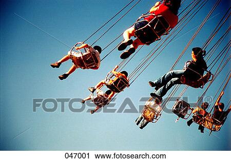Children on flying swings View Large Photo Image Stock Image - Children on flying swings. Fotosearch
