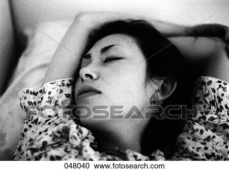 Stock Image - woman sleeping. Fotosearch