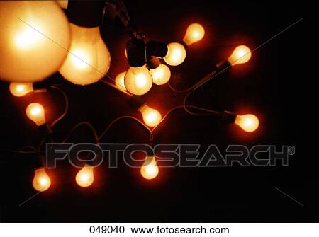 numerous light bulbs at night View Large Photo Image Stock Image - numerous light bulbs at night. Fotosearch