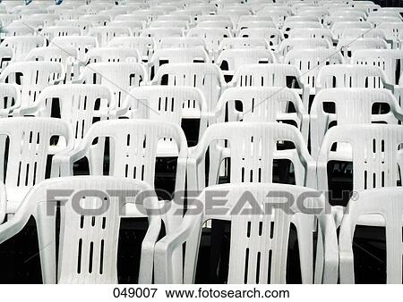rows of plastic chairs View Large Photo Image Stock Photo - rows of plastic chairs. Fotosearch