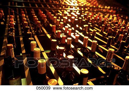 bottles of wine in a wine cellar View Large Photo Image Stock Photo - bottles of wine in a wine cellar. Fotosearch