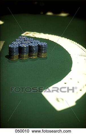 chips and cards spread out on a casino table View Large Photo Image Stock Image - chips and cards spread out on a casino table. Fotosearch