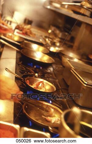 cooking in an industrial kitchen View Large Photo Image Stock Photograph - cooking in an industrial kitchen. Fotosearch