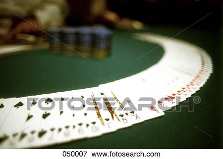 deck of cards on a poker table View Large Photo Image Stock Photo - deck of cards on a poker table. Fotosearch