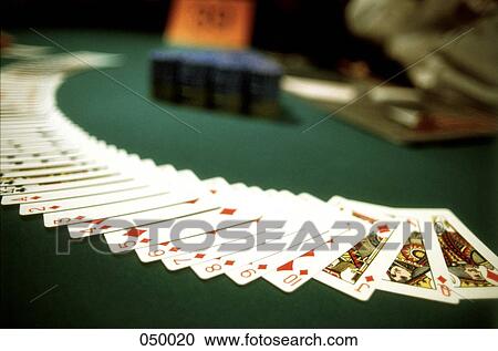 playing cards spread out across a casino table View Large Photo Image Stock Image - playing cards spread out across a casino table. Fotosearch