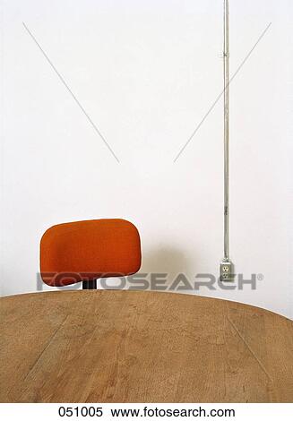 A chair next to an empty table View Large Photo Image Stock Photography - A chair next to an empty table. Fotosearch