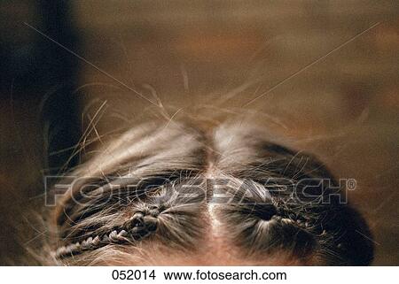 Braids in a young woman's hair View Large Photo Image Picture - Braids in a young woman's hair. Fotosearch
