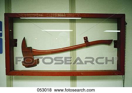 A fire axe in a glass case View Large Photo Image Stock Photo - A fire axe in a glass case. Fotosearch