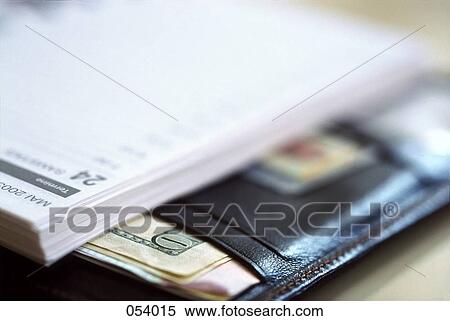 A calendar with money View Large Photo Image Stock Photography - A calendar with money. Fotosearch