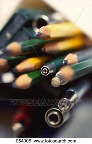 A collection of pencils and pens in a box View Large Photo Image Stock Photograph - A collection of pencils and pens in a box. Fotosearch