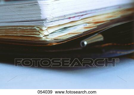 A pen in an organizer View Large Photo Image Stock Photo - A pen in an organizer. Fotosearch