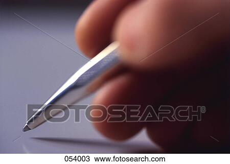 A person writing with a pen View Large Photo Image Stock Image - A person writing with a pen. Fotosearch