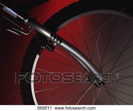 Stock Image - A bicycle tire anf fork. Fotosearch