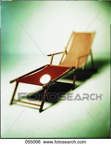 A red and orange lounge chair View Large Photo Image Stock Photograph - A red and orange lounge chair. Fotosearch
