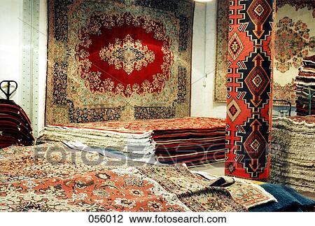 Oriental carpets in a shop View Large Photo Image Stock Image - Oriental carpets in a shop. Fotosearch