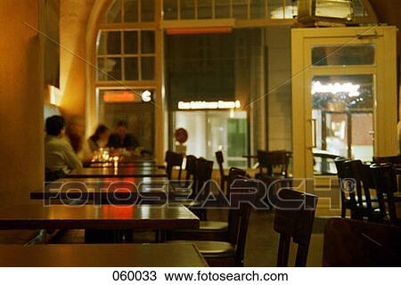 A cafe at night View Large Photo Image Stock Image - A cafe at night. Fotosearch