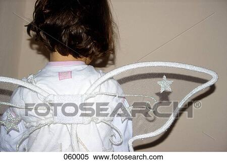 A child dressed as an angel View Large Photo Image Stock Photography - A child dressed as an angel. Fotosearch