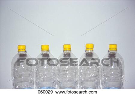 Five plastic bottles View Large Photo Image Stock Photo - Five plastic bottles. Fotosearch