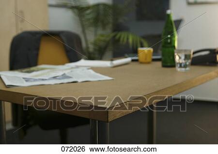 A desk in an office View Large Photo Image Stock Photograph - A desk in an office. Fotosearch