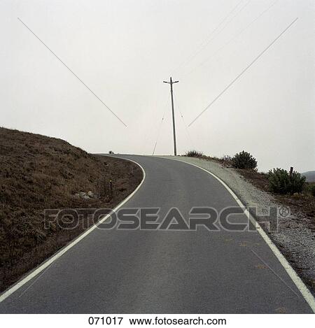 A curved road View Large Photo Image Stock Photo - A curved road. Fotosearch