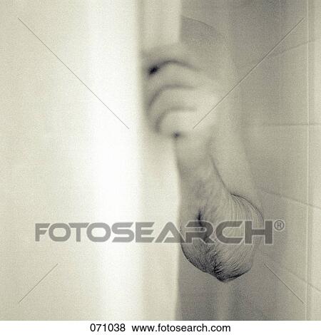 A man opening a shower curtain View Large Photo Image Stock Photo - A man opening a shower curtain. Fotosearch