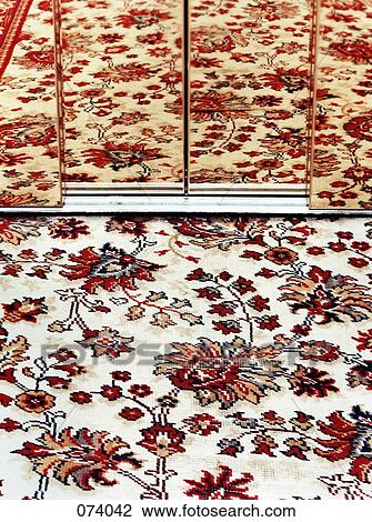 A mirrored rug pattern View Large Photo Image Stock Image - A mirrored rug pattern. Fotosearch