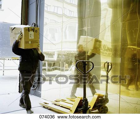 A person delivering a package View Large Photo Image Stock Photograph - A person delivering a package. Fotosearch