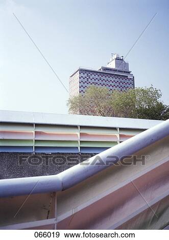 A passageway in front of a building View Large Photo Image Stock Photo - A passageway in front of a building. Fotosearch