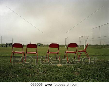 A row of chairs outside View Large Photo Image Stock Photograph - A row of chairs outside. Fotosearch
