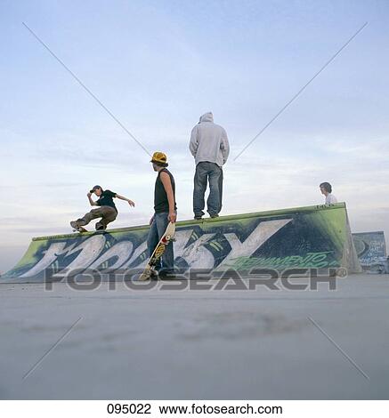 Group of skateboarders near ramp View Large Photo Image Stock Image - Group of skateboarders near ramp . Fotosearch