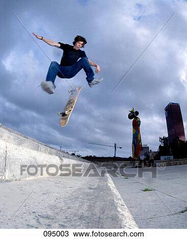 Man falling off skateboard in air View Large Photo Image Stock Image - Man falling off skateboard in air. Fotosearch