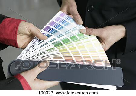 Woman and man holding color swatches View Large Photo Image Stock Image - Woman and man holding color swatches. Fotosearch