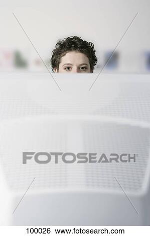 Woman staring at computer monitor View Large Photo Image Stock Photograph - Woman staring at computer monitor. Fotosearch