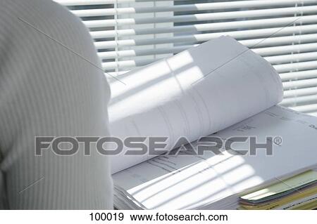 Stock Photo - Woman with filed documents. Fotosearch