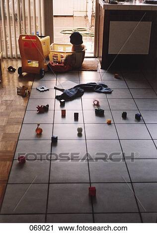 A child sitting on the floor with blocks View Large Photo Image Stock Image - A child sitting on the floor with blocks. Fotosearch