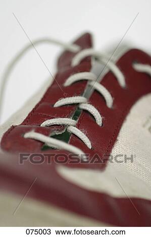 Stock Image - A tennis shoe. Fotosearch