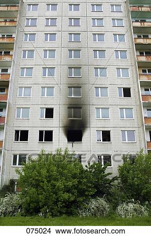 An apartment building after a fire View Large Photo Image Picture - An apartment building after a fire. Fotosearch