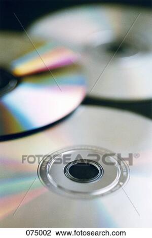 CD-ROMs on a table View Large Photo Image Stock Image - CD-ROMs on a table. Fotosearch