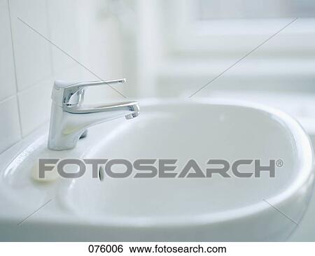 A bathroom sink View Large Photo Image Stock Photograph - A bathroom sink. Fotosearch