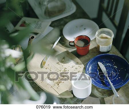Stock Photo - A messy breakfast table. Fotosearch